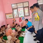 Polres Nganjuk Bagikan 100 Paket Makanan Bergizi Gratis untuk Siswa SDN 1 Munung