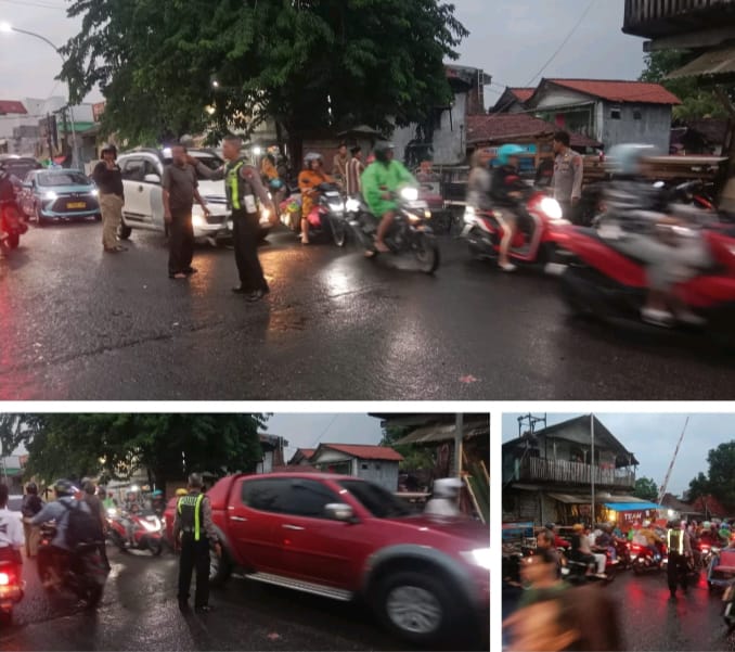 Pengaturan Lalu Lintas Polsek Semampir di Jalan Karang Tembok Saat Proses Evakuasi Remaja Tenggelam